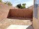 Enclosed backyard with brick perimeter walls, showcasing a clean and private outdoor space at 256 Camino Viejo St, Henderson, NV 89012