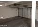 One-car garage with an open door and ample space for storage at 256 Camino Viejo St, Henderson, NV 89012