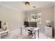 Well-lit home office featuring neutral decor, a comfortable workspace, and ample natural light at 2608 Prospector Mine Ave, North Las Vegas, NV 89031
