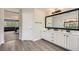 Well-lit main bathroom with double sinks and a modern design at 2608 Prospector Mine Ave, North Las Vegas, NV 89031