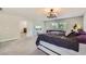 Large main bedroom boasts ample natural light, a vanity, and comfortable furnishings at 2608 Prospector Mine Ave, North Las Vegas, NV 89031
