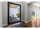 Open entrance showcases the modern design with the natural light from the courtyard at 2610 Eldora Estates Ct, Las Vegas, NV 89117