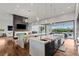 Spacious kitchen with an island, modern appliances, and an open layout perfect for entertaining guests at 2610 Eldora Estates Ct, Las Vegas, NV 89117