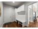 Functional mudroom with built-in bench, storage cabinets, and access to interior at 2610 Eldora Estates Ct, Las Vegas, NV 89117