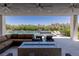Inviting outdoor living space featuring a pool, spa, fire pit, and comfortable seating area at 2610 Eldora Estates Ct, Las Vegas, NV 89117