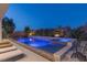 Tranquil backyard pool and spa area with comfortable lounge seating, perfect for relaxation at 2610 Eldora Estates Ct, Las Vegas, NV 89117