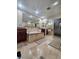 Elegant bathroom featuring a large soaking tub with tile surround, dual vanities, a shower, and a walk-in closet at 2913 Domino Way, Las Vegas, NV 89117