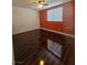 Bedroom features hardwood floors, a ceiling fan, and a window with natural light at 2913 Domino Way, Las Vegas, NV 89117