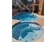 Backyard oasis with a sparkling pool, a built-in hot tub with jets, and ample patio space for lounging and entertaining at 2913 Domino Way, Las Vegas, NV 89117