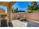 Backyard space equipped with a grill and cozy seating for outdoor relaxation at 3002 Coveri Ct, Las Vegas, NV 89141