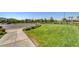 Lush green space with walking path, providing a serene environment for residents at 3002 Coveri Ct, Las Vegas, NV 89141
