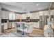 Beautiful kitchen featuring stainless steel appliances, granite countertops, and a large island with seating at 3002 Coveri Ct, Las Vegas, NV 89141