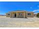 Rear view of property with covered patio at 3016 Mount Charleston Dr, Pahrump, NV 89048