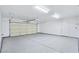 Spacious two-car garage with epoxy flooring and ample lighting at 3016 Mount Charleston Dr, Pahrump, NV 89048