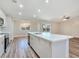 Spacious kitchen featuring a large island with marble countertops and stainless steel appliances at 3016 Mount Charleston Dr, Pahrump, NV 89048