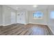 Open living room with modern flooring and ample natural light at 3016 Mount Charleston Dr, Pahrump, NV 89048