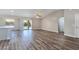 Bright, open concept living room with sliding glass doors to backyard at 3016 Mount Charleston Dr, Pahrump, NV 89048