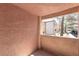 Enclosed balcony view showing the exterior of the building and its surroundings, showcasing the community at 3151 Soaring Gulls Dr # 1021, Las Vegas, NV 89128