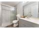 Updated bathroom with a tiled shower, modern vanity, and a large mirror at 3151 Soaring Gulls Dr # 1021, Las Vegas, NV 89128