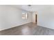 Neutral bedroom with wood flooring, a bright window, and fresh, clean walls at 3151 Soaring Gulls Dr # 1021, Las Vegas, NV 89128