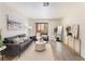 Bright living room with contemporary furniture, stylish decor, and a sliding glass door to the outside at 3151 Soaring Gulls Dr # 1021, Las Vegas, NV 89128