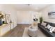 Open-concept living room with modern furnishings and ample natural light at 3151 Soaring Gulls Dr # 1021, Las Vegas, NV 89128