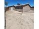 View of the home's backyard, ready for landscaping and personalization at 3318 Covey Ln, Las Vegas, NV 89115