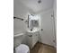 Updated bathroom features modern vanity, black hardware, and a new light fixture at 3318 Covey Ln, Las Vegas, NV 89115