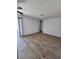 The living room features wood floors and a glass patio door at 3318 Covey Ln, Las Vegas, NV 89115