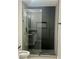 Contemporary bathroom featuring walk-in shower with sleek glass door and modern vanity at 3327 Erva St # 222, Las Vegas, NV 89117
