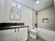 Modern bathroom featuring stylish vanity, updated fixtures, and sleek tiled shower at 3327 Erva St # 222, Las Vegas, NV 89117