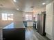 Stylish kitchen with a large island, stainless steel appliances, and modern finishes at 3327 Erva St # 222, Las Vegas, NV 89117