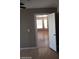 Bedroom with neutral walls, hardwood floors, and a white door at 3439 Cox St, North Las Vegas, NV 89032