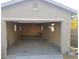 Spacious garage with high ceilings and ample room for parking and storage at 3439 Cox St, North Las Vegas, NV 89032