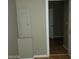 Hallway with hardwood floors, neutral-colored walls, and white trim at 3439 Cox St, North Las Vegas, NV 89032