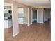 View of living room leading into eat-in kitchen area and bathroom at 3439 Cox St, North Las Vegas, NV 89032