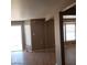 Spacious living room with hardwood floors and backyard access at 3439 Cox St, North Las Vegas, NV 89032