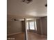 Open floor plan featuring hardwood floors, ceiling fan and bright lighting at 3439 Cox St, North Las Vegas, NV 89032