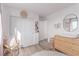 Bright Bedroom features a wood dresser, area rug, closet, and decor at 360 Rosefinch St, Henderson, NV 89012