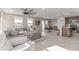 Open floor plan showcasing the living room, dining area, and kitchen with modern finishes at 360 Rosefinch St, Henderson, NV 89012