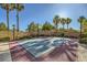 Private basketball court with an appealing home and picturesque palm trees in background at 4217 Bridesmaid Falls Ave, North Las Vegas, NV 89085