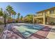 Backyard view of a basketball court with an elegant two-story home and inviting patio at 4217 Bridesmaid Falls Ave, North Las Vegas, NV 89085