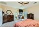 Bedroom with a TV and dresser, leading to a bathroom at 4217 Bridesmaid Falls Ave, North Las Vegas, NV 89085
