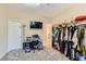 Walk-in closet with clothing racks, desk and ample space at 4217 Bridesmaid Falls Ave, North Las Vegas, NV 89085