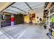 Spacious garage featuring ample storage cabinets and room for parking vehicles at 4217 Bridesmaid Falls Ave, North Las Vegas, NV 89085