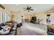 Bright living room with a comfortable seating area and seamless transition to the upstairs hallway at 4217 Bridesmaid Falls Ave, North Las Vegas, NV 89085