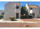 An attractive condominium with a terracotta roof and well maintained desert landscaping at 4230 Gannet Cir # 216, Las Vegas, NV 89103