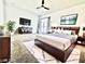 Staged bedroom with a large bed and furniture set at 4324 El Conlon Ave, Las Vegas, NV 89102