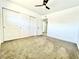 Bedroom featuring a ceiling fan and large closet at 4324 El Conlon Ave, Las Vegas, NV 89102