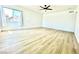 Large bedroom with sleek flooring and a big window that fills the space with natural light at 4324 El Conlon Ave, Las Vegas, NV 89102